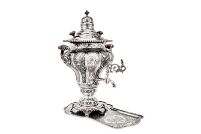 Lot 297 - A large early to mid-20th century Iranian (Persian) unmarked silver samovar on stand, Isfahan circa 1920-40