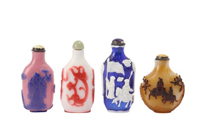 Lot 643 - FOUR CHINESE PEKING OVERLAY GLASS SNUFF BOTTLES.