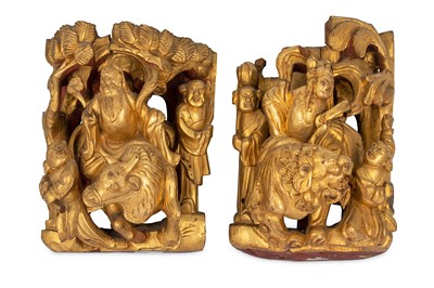 Lot 637 - A PAIR OF CHINESE GILT-WOOD RETICULATED 'IMMORTALS' PANELS.