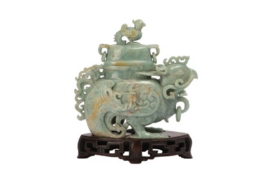 Lot 97 - A CHINESE JADEITE 'PHOENIX' VASE AND COVER.