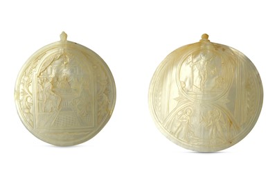 Lot 102 - λ TWO CARVED MOTHER-OF-PEARL SHELL PLAQUES WITH CHRISTIAN SCENE