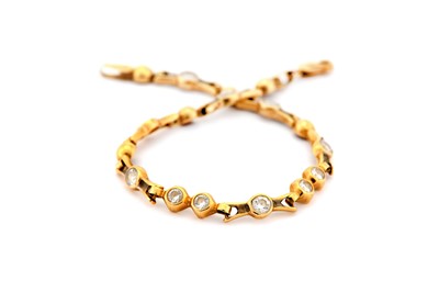 Lot 25 - A fancy-link bracelet, set with imitation...