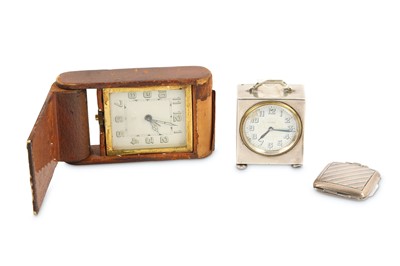 Lot 203 - A miniature silver cased clock, circular white...