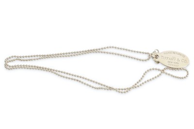 Lot 134 - A Tiffany & Co Sterling silver tag pendant...