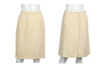 Lot 63 - Two Chanel and Chanel Boutique Cream Boucle Skirts - sizes 38 and 40