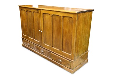 Lot 273 - An early 20th century pine double-fronted...