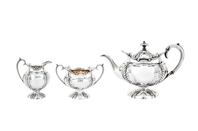 Lot 464 - An Edwardian sterling silver three-piece bachelor tea set, Sheffield 1903 by Fenton, Russell & Co Ltd