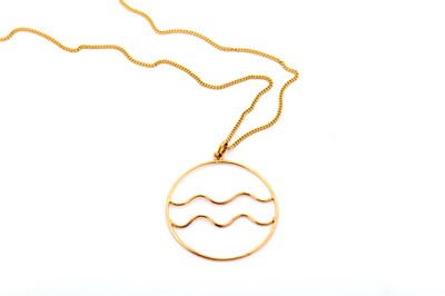Lot 23 - A Zodiac sign pendant necklace, the large...