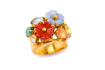 Lot 29 - A gem-set dress ring, the wide tapered band...