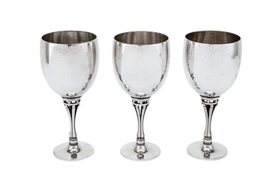 Lot 281 - A set of three late 20th century Danish sterling silver water goblets, Copenhagen designed by Harald Nielsen (1892-1977) for Georg Jensen, import marks for London 1992