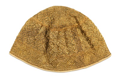 Lot 61 - A DOMED SKULL CAP
