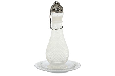 Lot 323 - A CLEAR BRILLIANT-CUT GLASS DECANTER WITH SAUCER MADE FOR THE INDIAN EXPORT MARKET