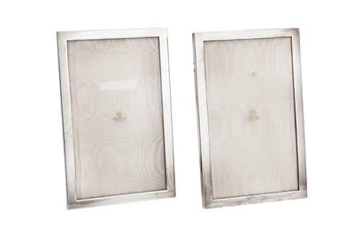 Lot 216 - A pair of Victorian sterling silver mounted photograph frames, London 1899 by James Samuel Bell & Louis Willmott (active 1894-1906)