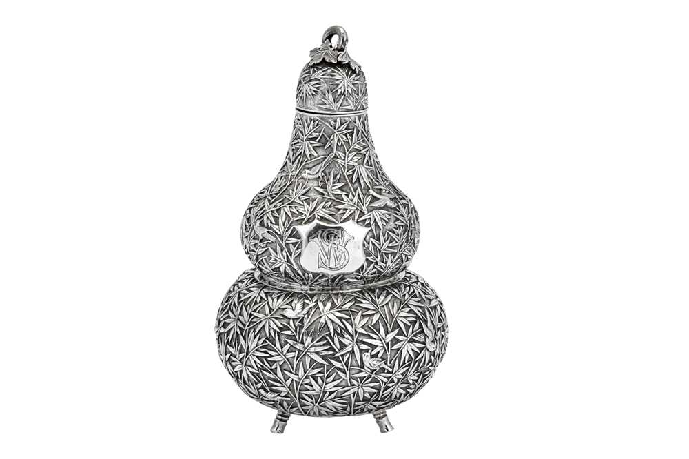 Lot 247 - A mid to late 19th century Chinese export silver double gourd tea caddy or wine bottle, Canton circa 1870 retailed by Cum Shing