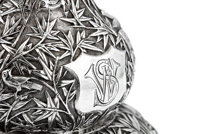 Lot 247 - A mid to late 19th century Chinese export silver double gourd tea caddy or wine bottle, Canton circa 1870 retailed by Cum Shing
