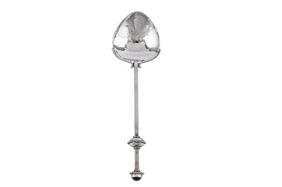 Lot 527 - A George V sterling silver gem set ‘arts and crafts’ spoon, Birmingham 1929 by A. E. Jones