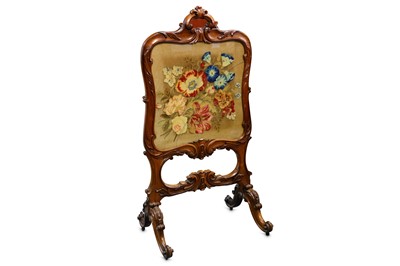 Lot 291 - An early Victorian rosewood fire screen, the...