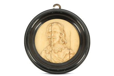 Lot 215 - A Georgian circular ivory portrait miniature...