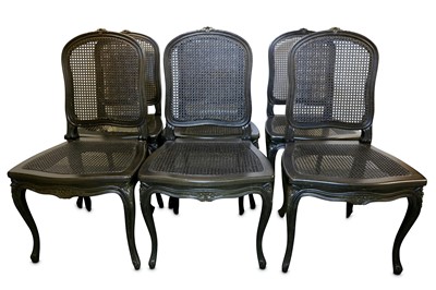 Lot 323 - A set of six blackened oak and caned French...