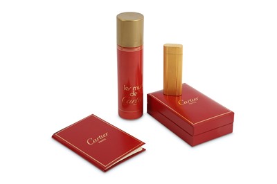 Lot 142 - A Cartier gold plated lighter, number 08861B...