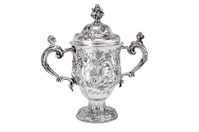 Lot 578 - A fine early George III sterling silver twin handled cup and cover, London 1760 by Charles Wright and Thomas Whipham