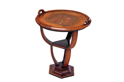 Lot 265 - An Art Deco walnut etagere of circular form,...