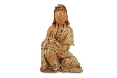 Lot 67 - A CHINESE SOAPSTONE FIGURE OF GUANYIN.