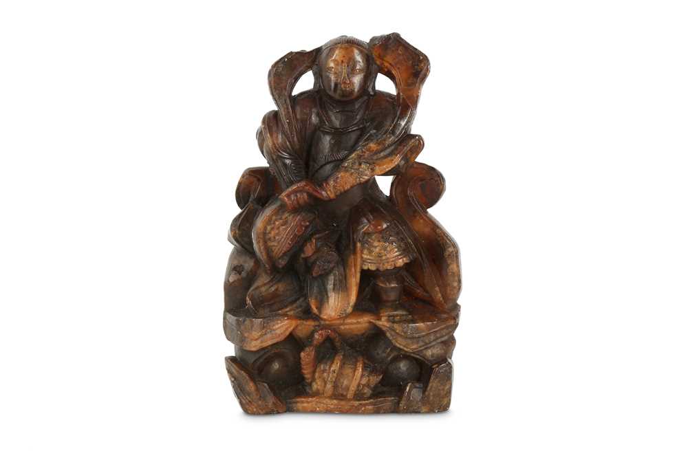 Lot 64 - A CHINESE SOAPSTONE CARVING OF XUANWU.