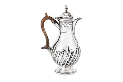 Lot 462 - A Victorian sterling silver hot milk pot, London 1886 by Daniel and John Welby