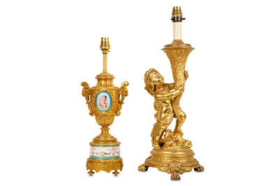 Lot 260 - A LOUIS XVI STYLE GILT METAL FIGURAL LAMP BASE...