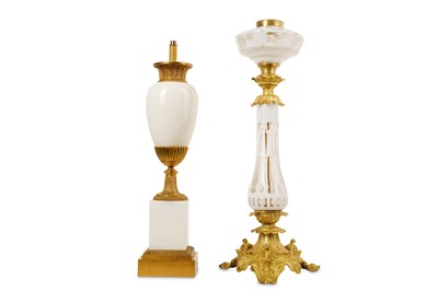 Lot 255 - A GILT BRONZE AND OPALINE GLASS LAMP BASE...