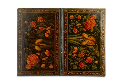 Lot 149 - *A QAJAR LACQUERED PAPIER-MÂCHÉ FLORAL BINDING