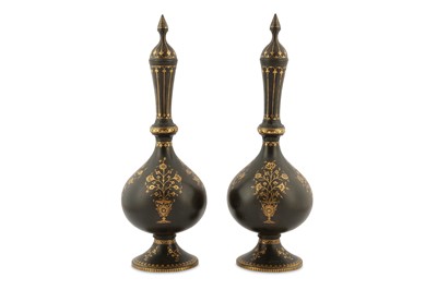 Lot 137 - *A PAIR OF QAJAR GOLD-DAMASCENED STEEL BOTTLES