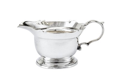 Lot 509 - A George II sterling silver small sauceboat, London 1729 by John Eckfourd II (reg. 23rd June 1725)