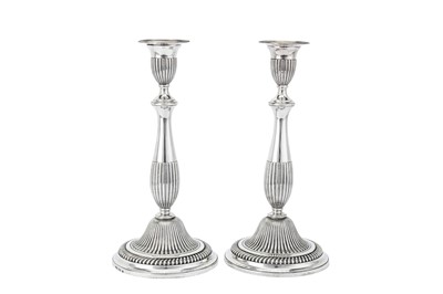 Lot 551 - A pair of George III sterling silver candlesticks, London 1798 by John Wakelin and Robert Garrard (reg. 20th Oct 1792)
