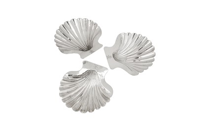 Lot 550 - A set of three George III sterling silver butter / seafood shells, London 1803 by Robert Garrard I (reg. 11th Aug 1802)