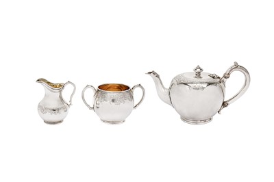 Lot 302 - A Victorian sterling silver three-piece tea service, London 1869/70 by John Samuel Hunt and Robert Roskell