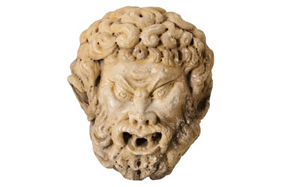 Lot 32 - AN 18TH CENTURY ITALIAN CARVED MARBLE FOUNTAIN HEAD DEPICTING A BEARDED SATYR