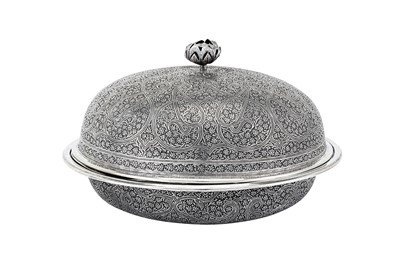 Lot 296 - An early 20th century Anglo – Indian Raj unmarked silver muffin dish, Kashmir circa 1920