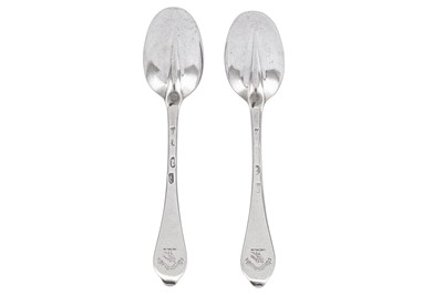 Lot 335 - A pair of Queen Anne Britannia standard silver dog nose table spoons, London 1704 by Isaac Davenport (reg. April 1697)