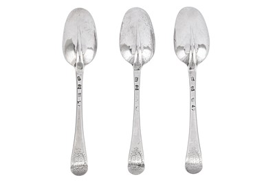Lot 336 - A set of three George I sterling silver tablespoons, London 1722 by Hugh Arnett and Edward Pocock (reg. 22nd June 1720)