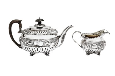 Lot 478 - A George IV sterling silver part-tea service, the teapot London 1821 by Stephen Adams II (reg. 14th Nov 1813)