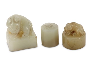 Lot 55 - THREE CHINESE PALE CELADON JADE SEALS.