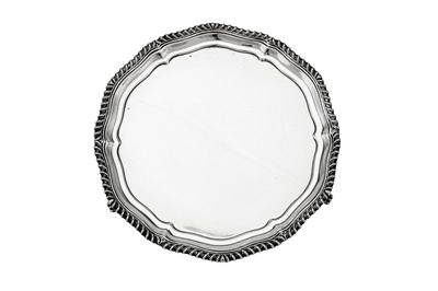 Lot 458 - A George V sterling silver salver, Sheffield 1913 by Martin, Hall & Co