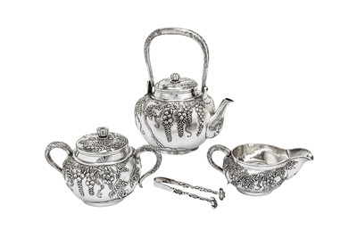 Lot 303 - An early 20th century Japanese silver three-piece tea service, circa 1920