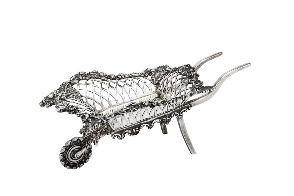 Lot 11 - An Edwardian sterling silver novelty bon bon wheelbarrow, London 1908 by Goldsmiths and Silversmiths