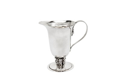 Lot 342 - A George V sterling silver cream or milk jug, London 1930 by Charles Boyton