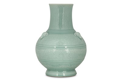 Lot 612 - A CHINESE CELADON-GLAZED 'THREE RAMS' VASE.
