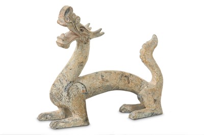 Lot 471 - A CHINESE POTTERY FIGURE OF A DRAGON.