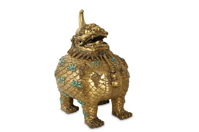 Lot 387 - A CHINESE GILT-BRONZE TURQUOISE-INLAID 'LUDUAN' INCENSE BURNER.